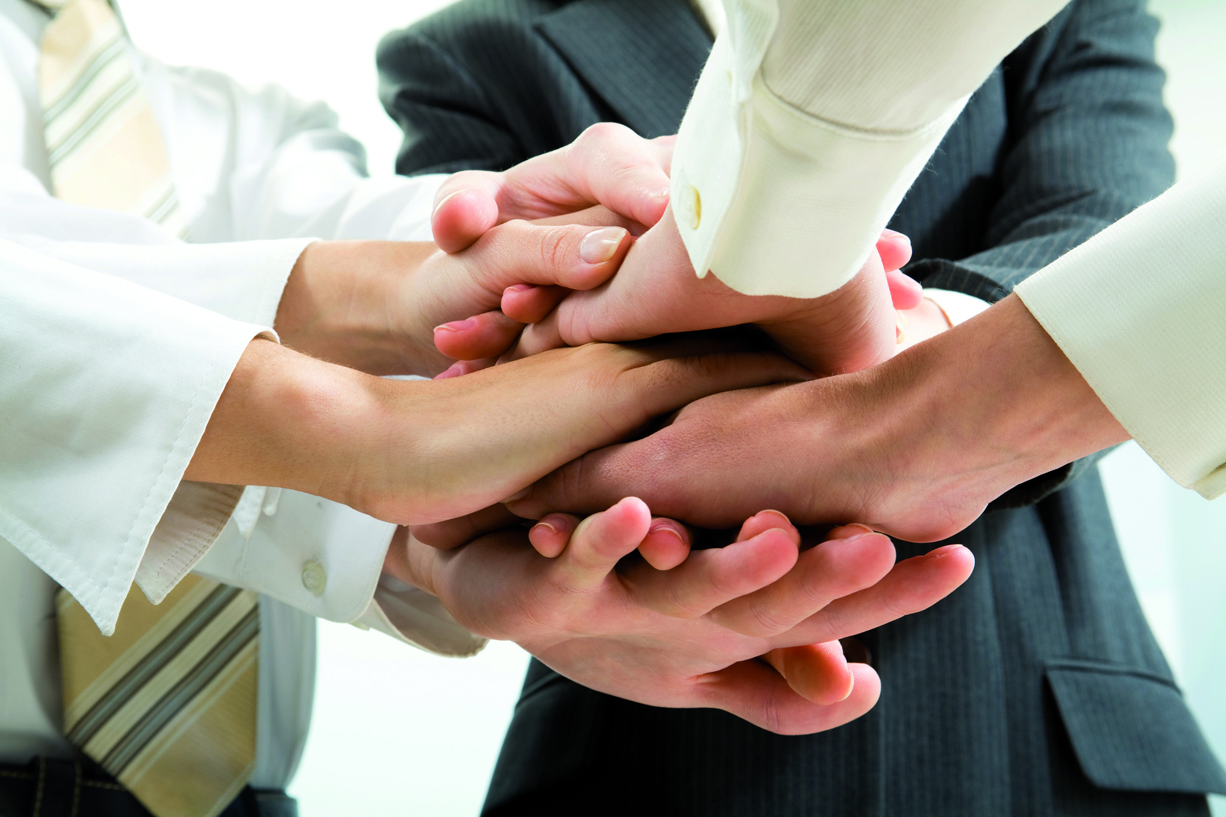 Booklet hands shutterstock 62848534